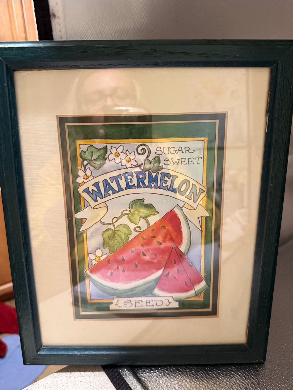 “Large Watermelon Seed Packet” framed picture of a watermelon seed packet.